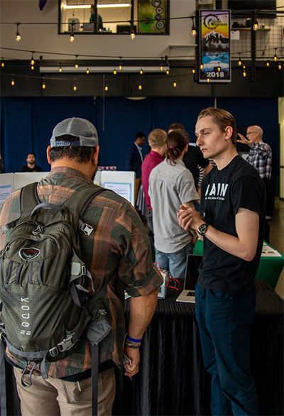 Brendan Studebaker, '19, Biomedical Sciences, describes his start-up Endofin Pharmaceuticals during the trade-show round of the 2019 VIBE Business Plan Competition.