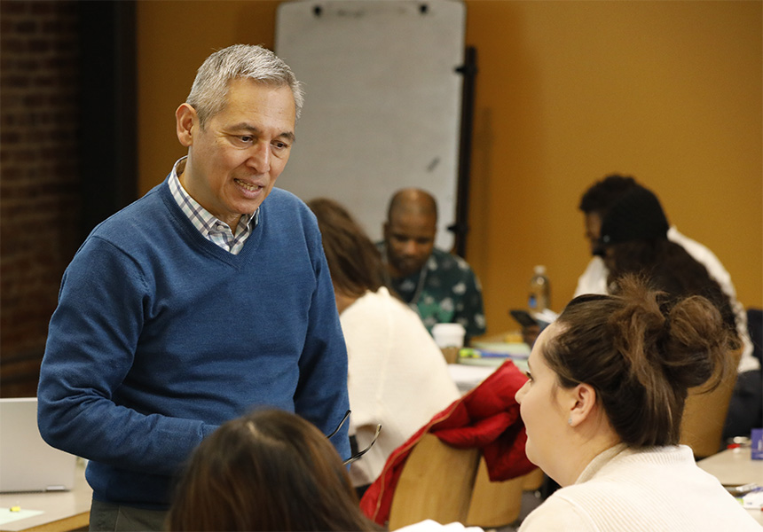 Dr. David Reyes teaching a business of health care class in 2017.