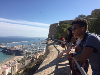 Students overlooking the sea from the castle in Alicante