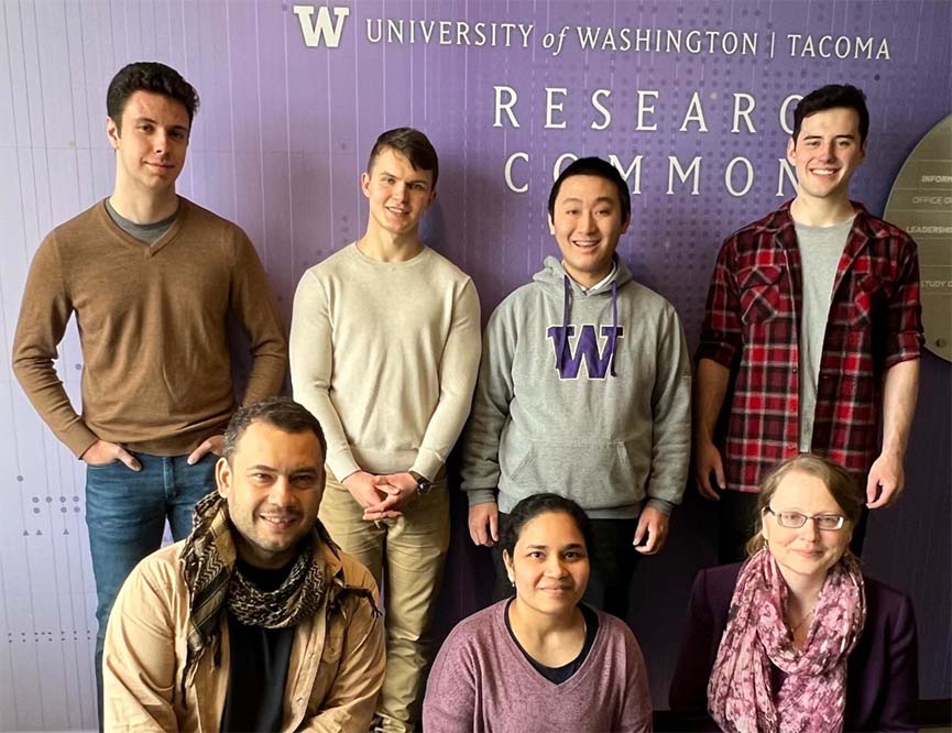 Team FLHuskies2 with (front, from left) Anderson Nascimento, Sikha Pentyala, Martine De Cock; (rear, from left) Kyler Robison, Daniil Filienko, Yudong Lin, Trevor Tomlin.