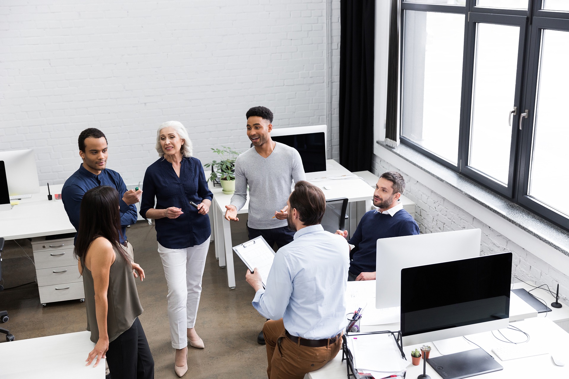 Office workers standing together