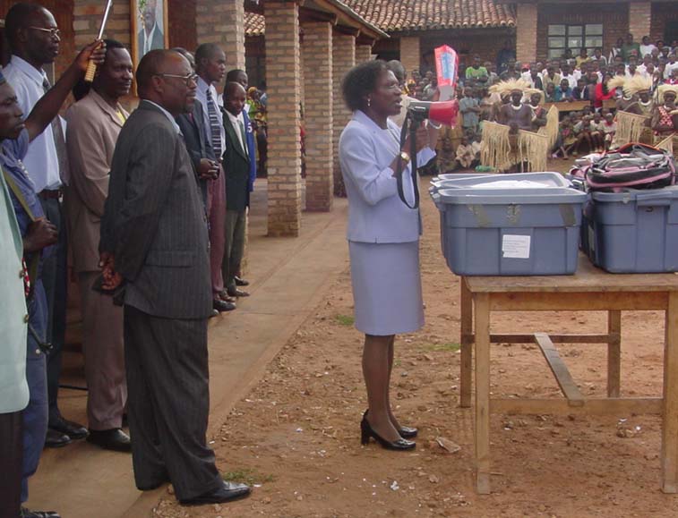 Dr. Elavie Ndura speaking at an event opening a new school in Bugenyuzi, Karusi, Burundi.