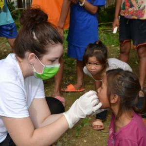 Katelyn demonstrating oral hygiene. 