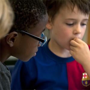 Two young boys in school