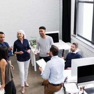 Office workers standing together